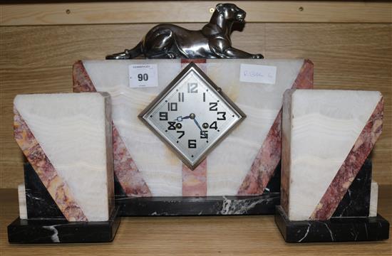 An Art Deco panther clock set